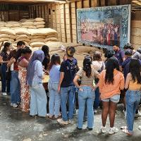 Group photo listening to a tour guide